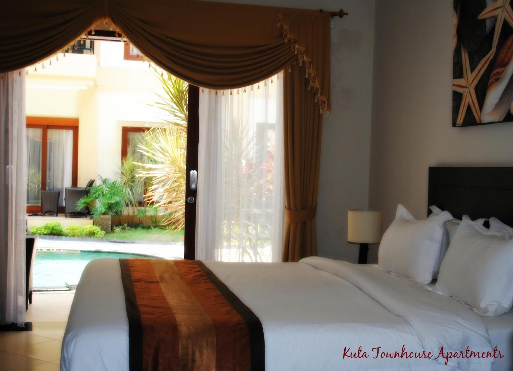 Kuta Town House Apartments Номер фото